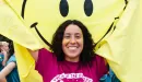 Thumbnail: Smiling staff female with big yellow smiley face