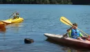 Thumbnail: Three kids kayaking