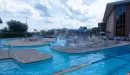 Thumbnail: view of lazy river and lap lanes at the carondelet park rec complex outdoor aquatic center