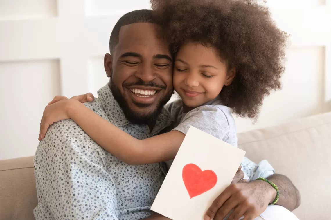 dad and child hugging