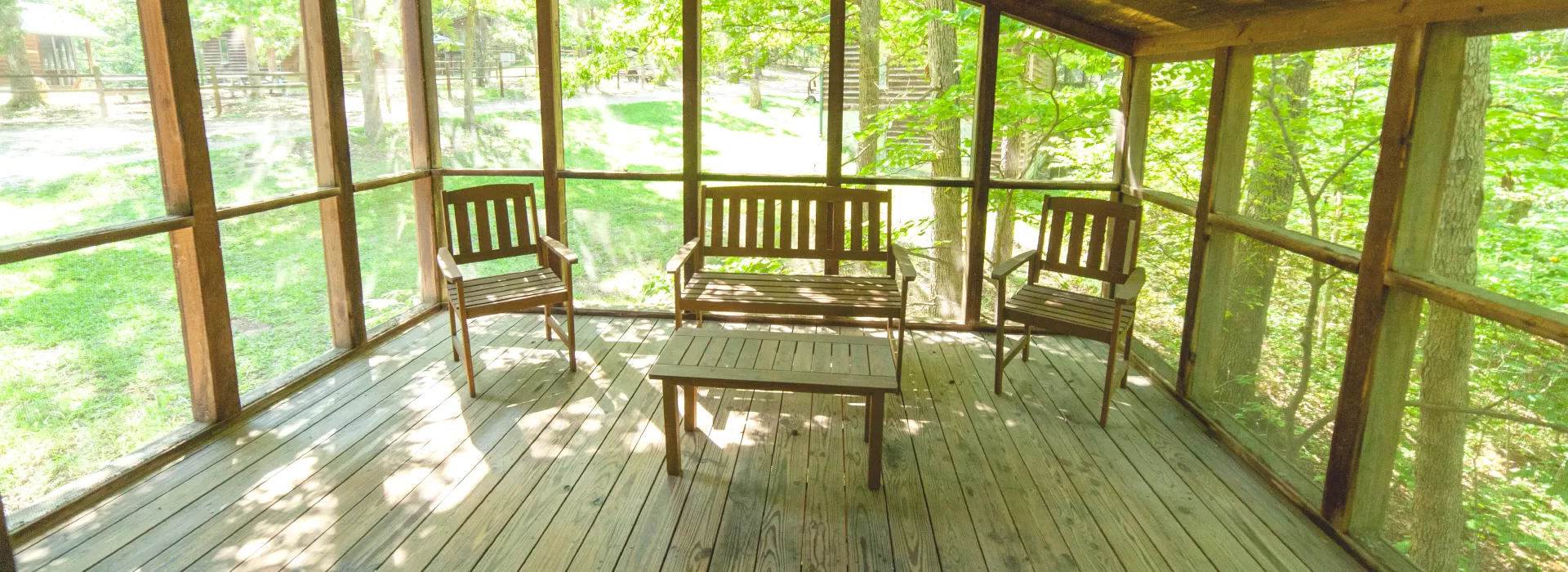 trout lodge screened in porch in forest view cabins