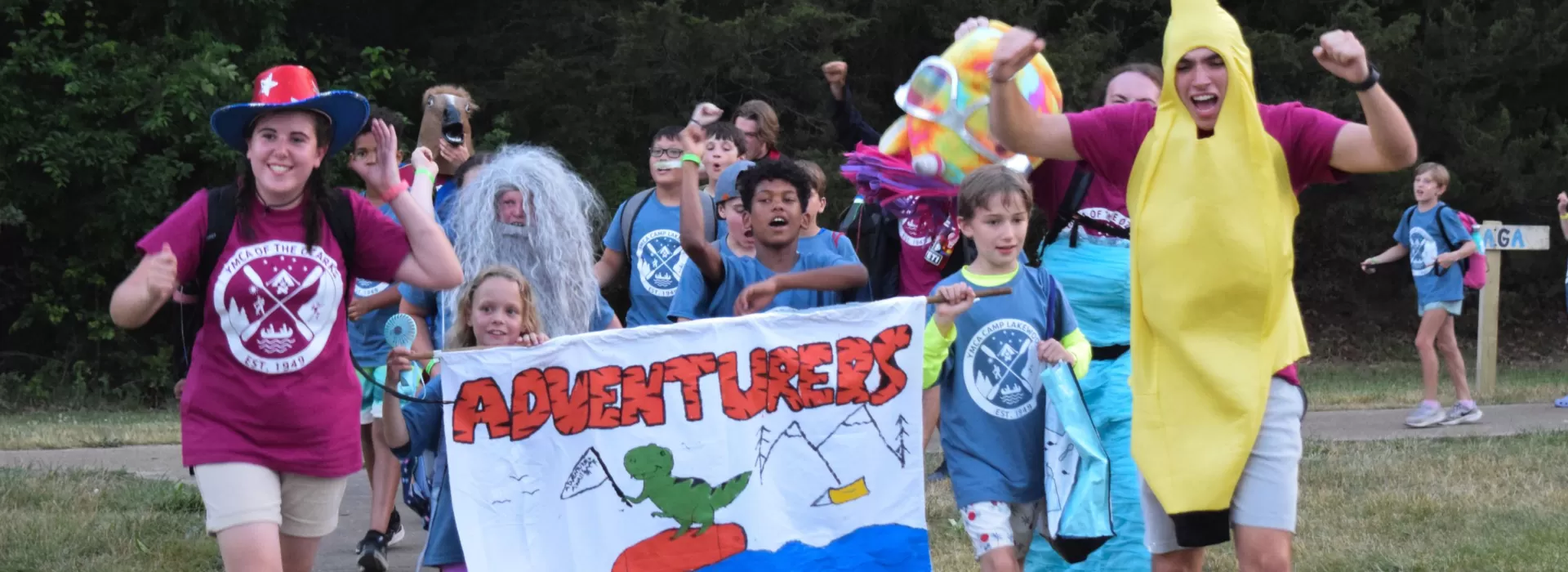 Staff bringing Adventurer group to campfire