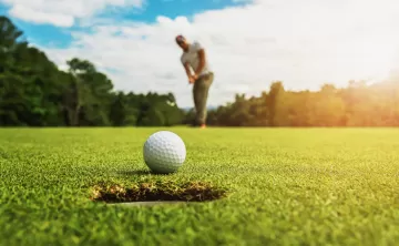 man golfing